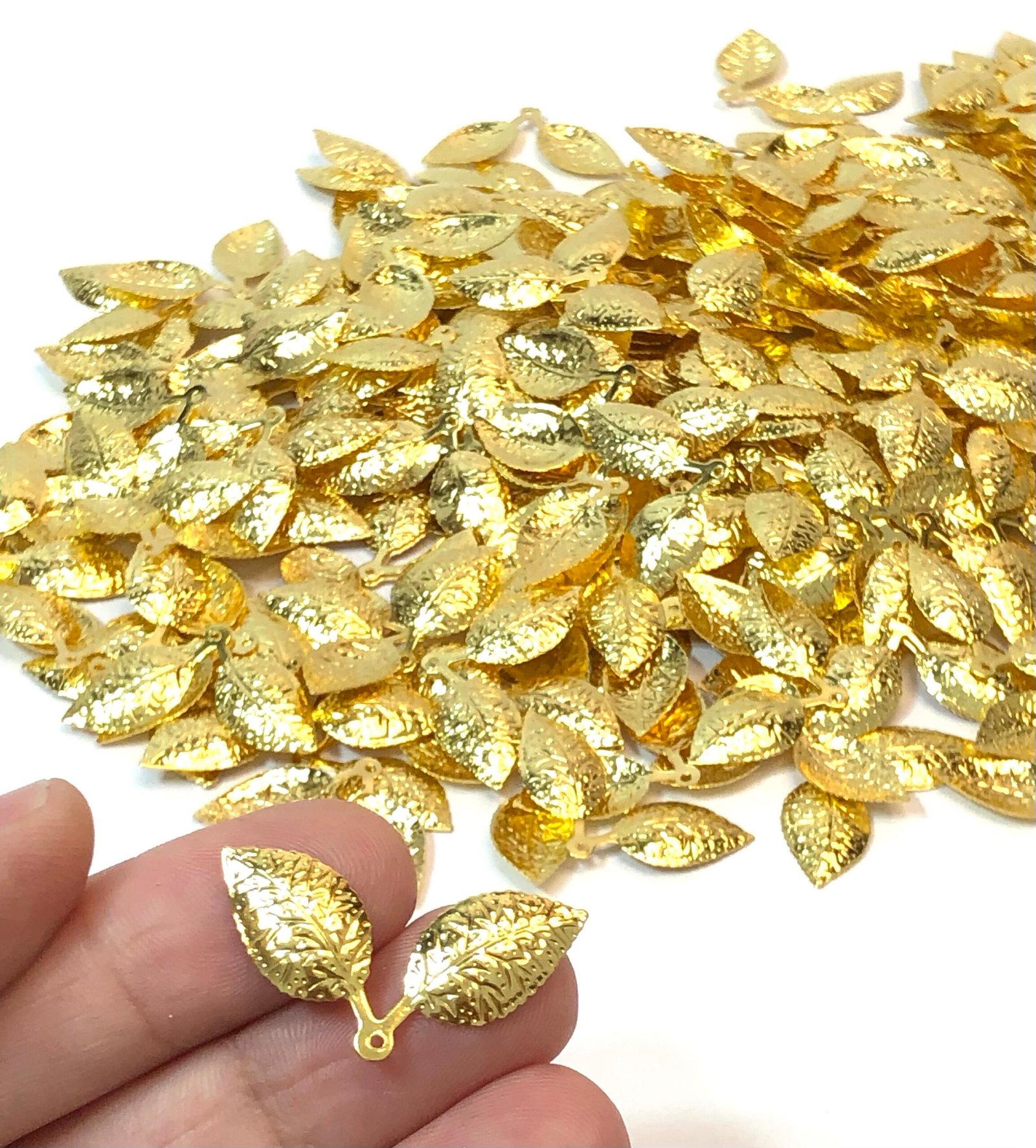 Folha dupla Metal dourado 1,5x3cm20unid