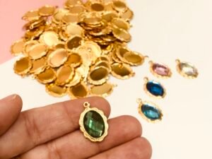 Medalha Dourada/encaixe pedra10x14 -06gramas-Aprx 25unid