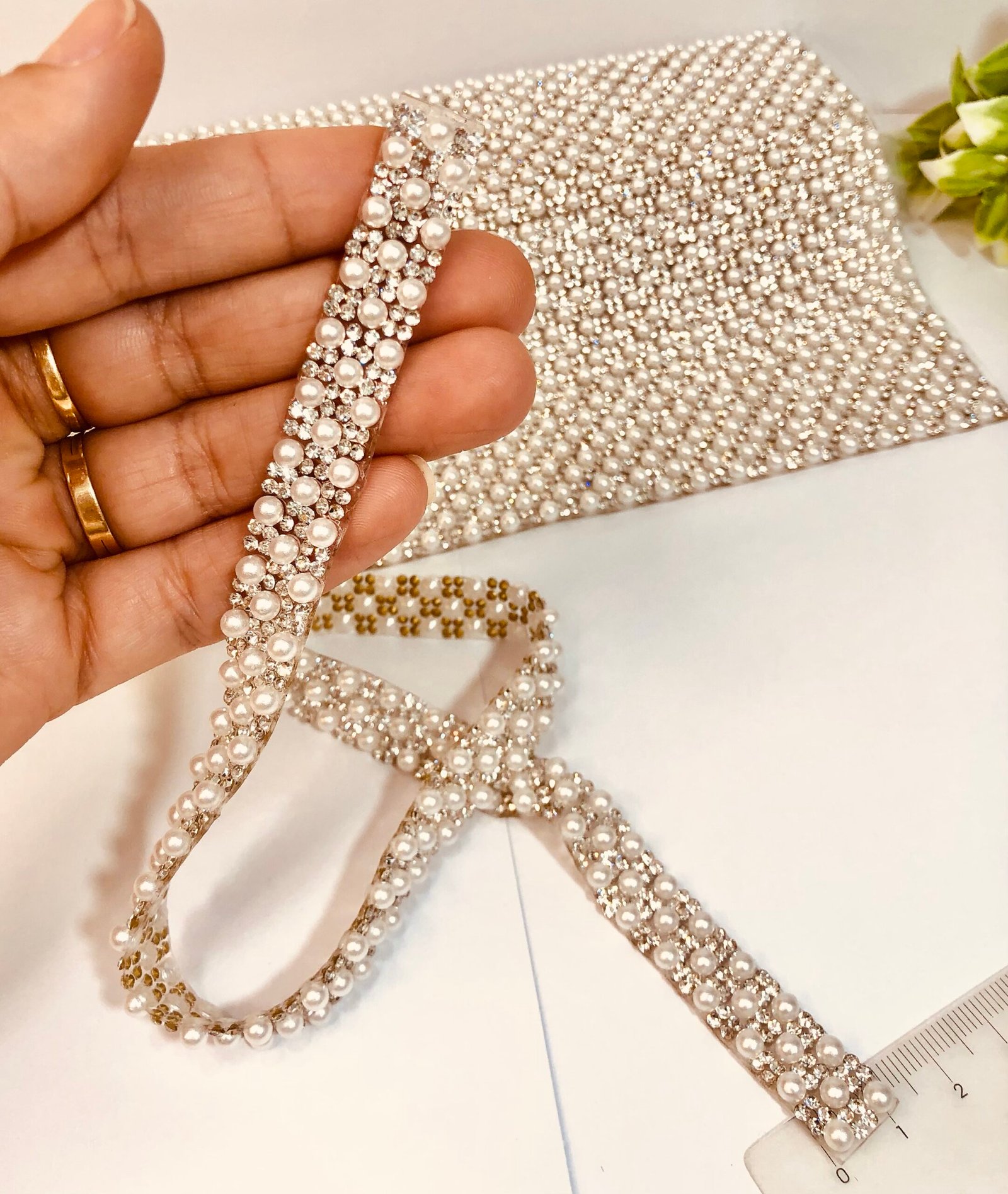 Manta Pérolas e strass
1.2mm x 0,40(fileira)